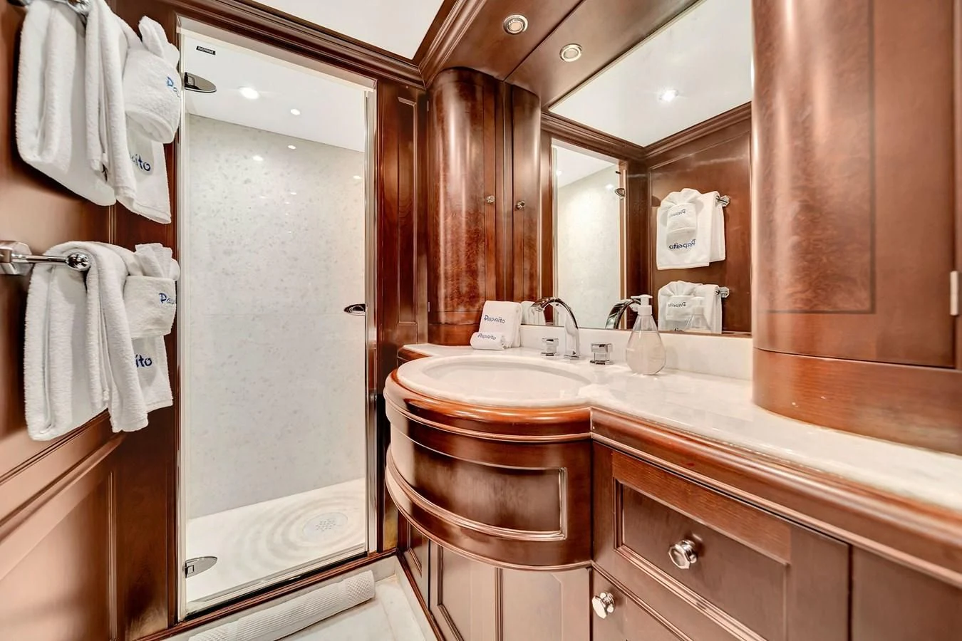 a bathroom with a sink and a mirror aboard CRISTOBAL Yacht for Charter