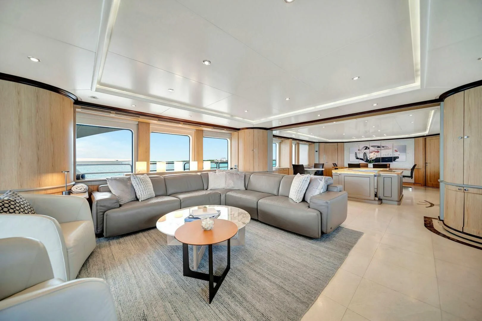 a living room with a couch and a coffee table aboard CRISTOBAL Yacht for Charter
