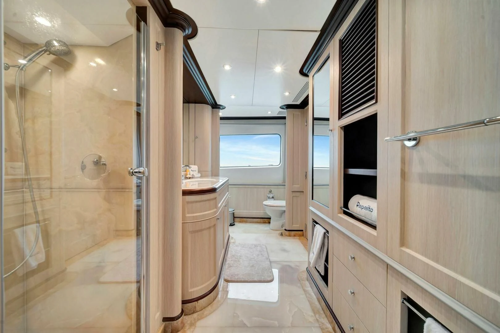 a bathroom with a glass shower aboard CRISTOBAL Yacht for Charter