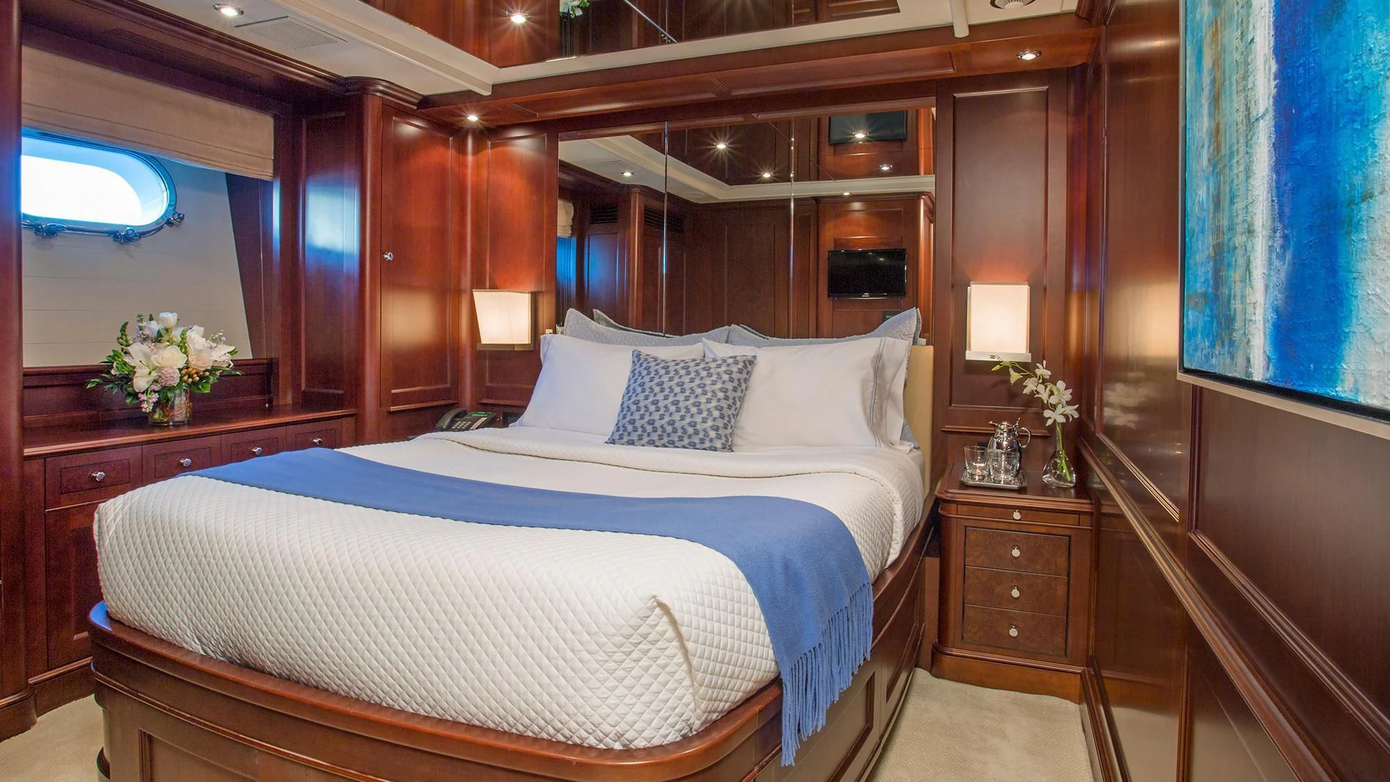 a bed in a room aboard CRISTOBAL Yacht for Charter