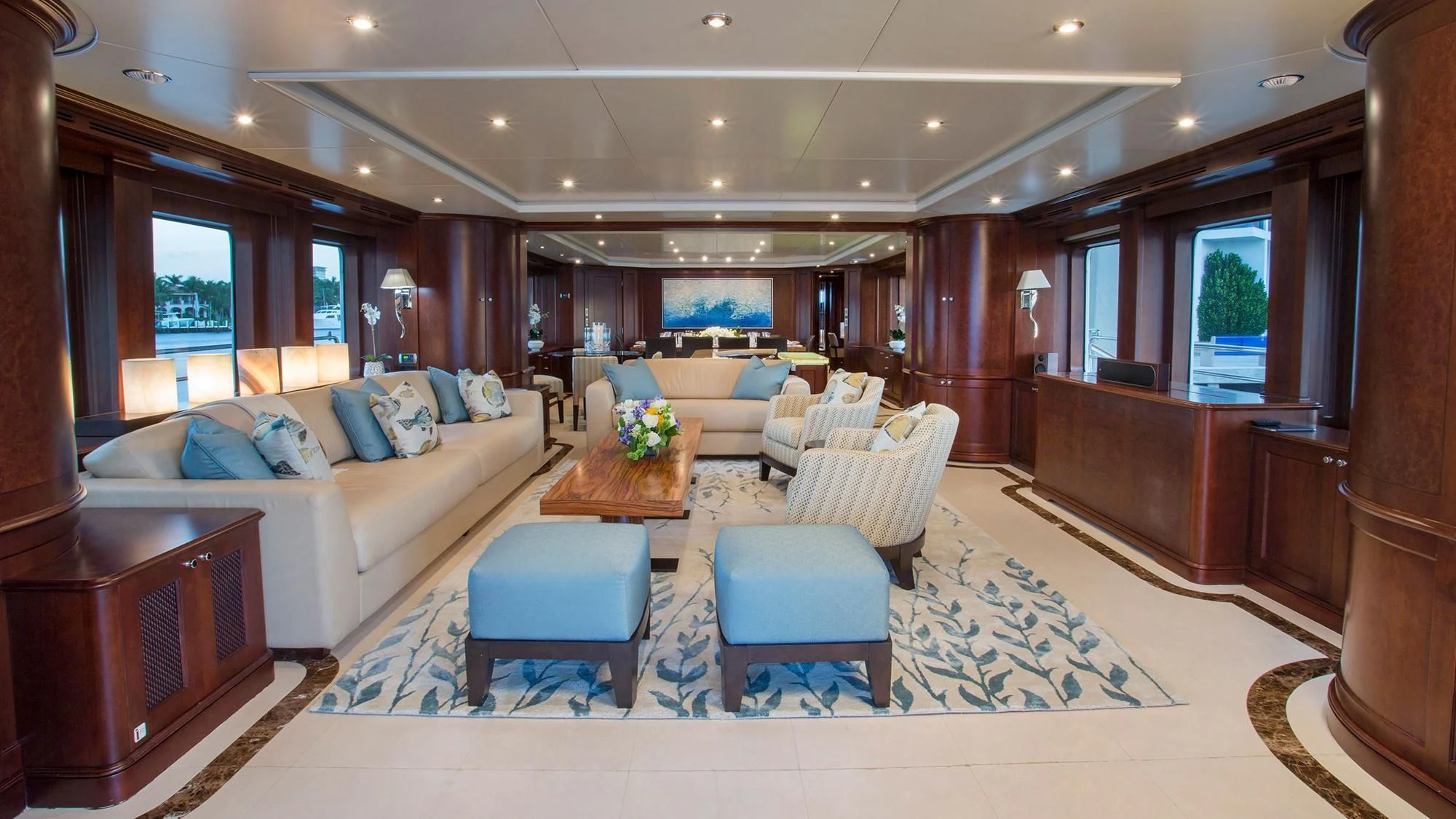 a living room with a couch and a coffee table aboard CRISTOBAL Yacht for Charter