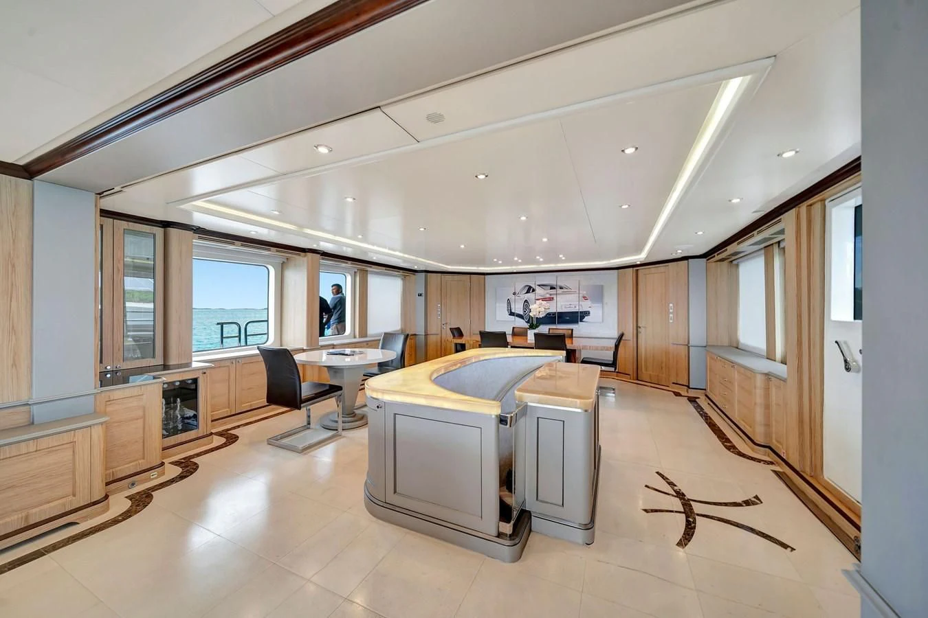 a large empty office space aboard CRISTOBAL Yacht for Charter