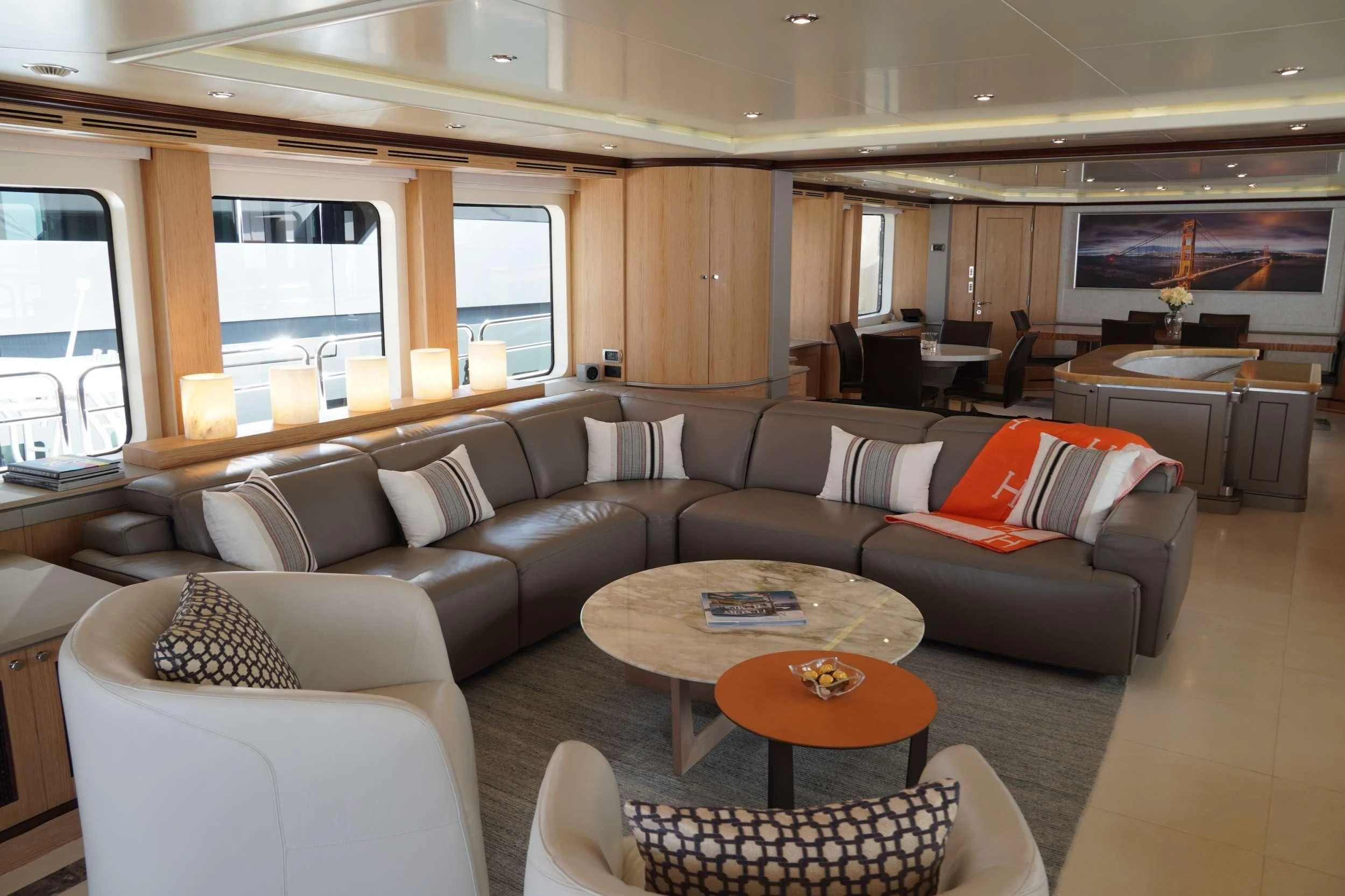 a living room with a couch and a coffee table aboard CRISTOBAL Yacht for Charter