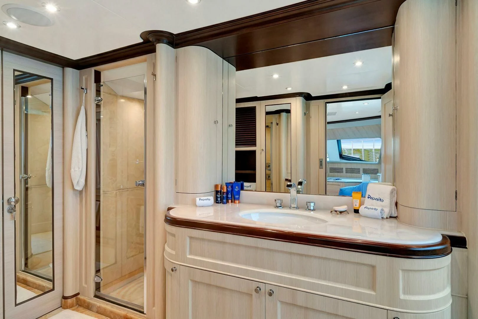 a bathroom with a sink and a mirror aboard CRISTOBAL Yacht for Charter