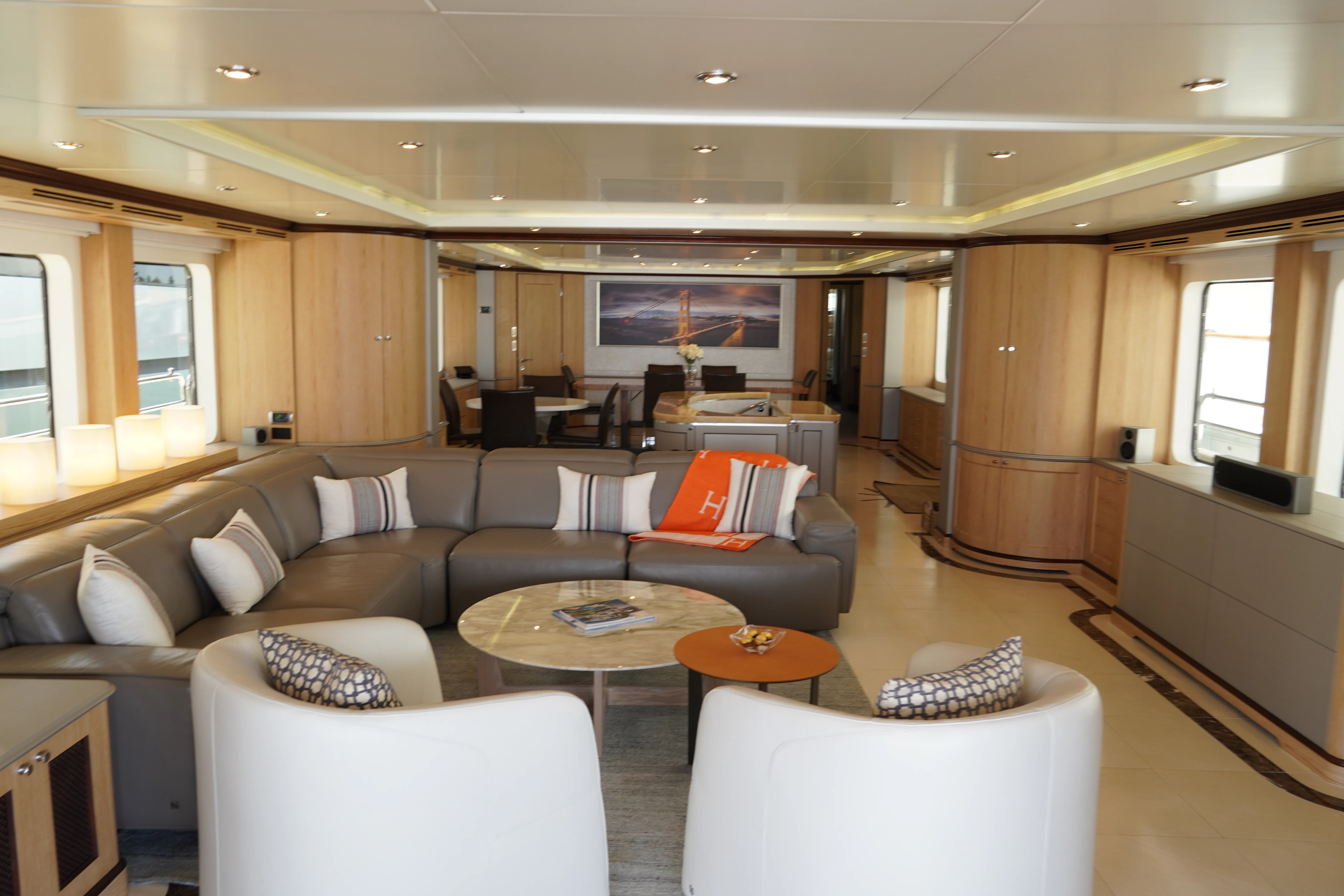 a living room with a couch and a coffee table aboard CRISTOBAL Yacht for Charter