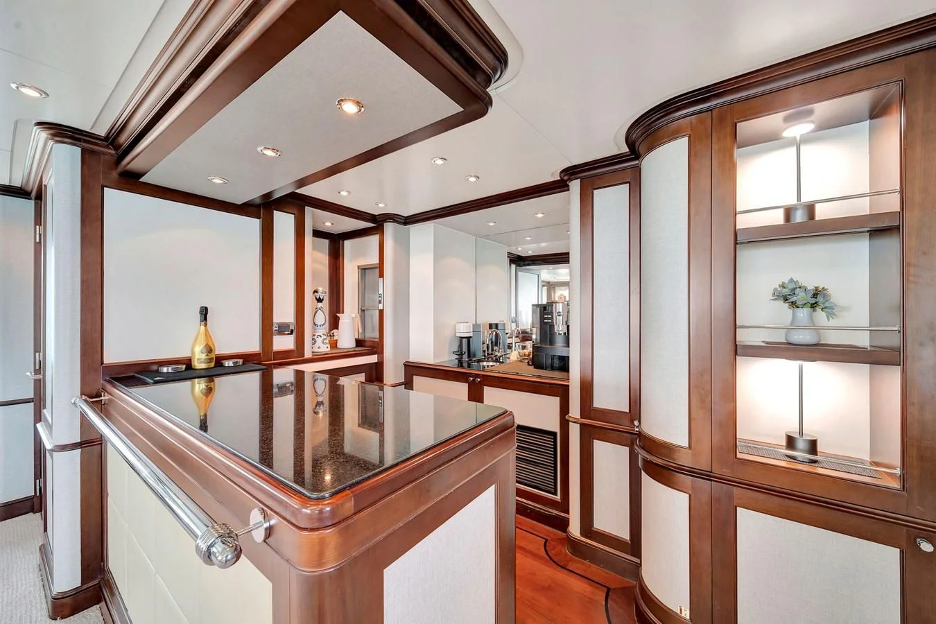 a kitchen with a glass wall aboard CRISTOBAL Yacht for Charter