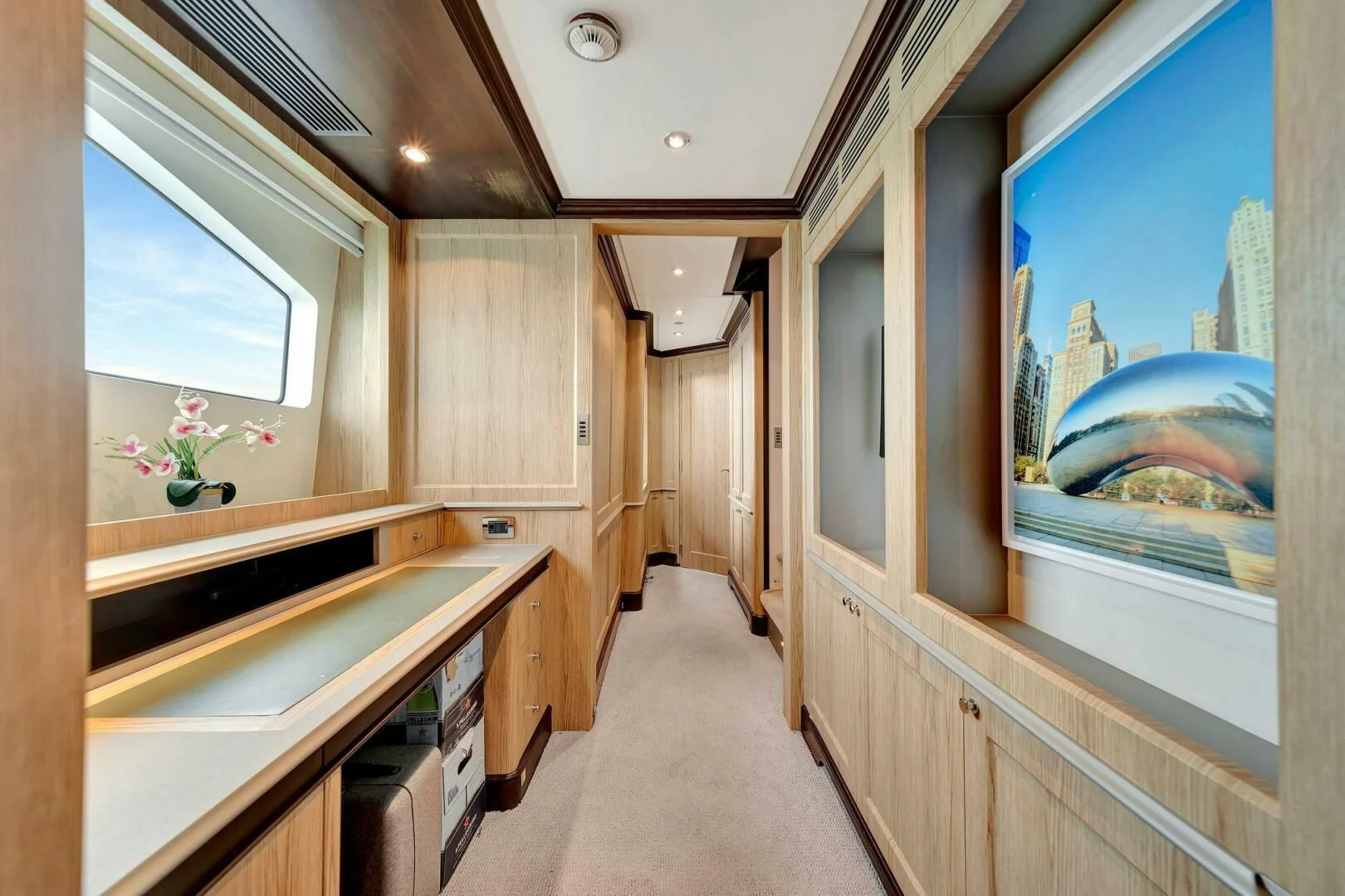 a room with a large window and a large fish tank aboard CRISTOBAL Yacht for Charter
