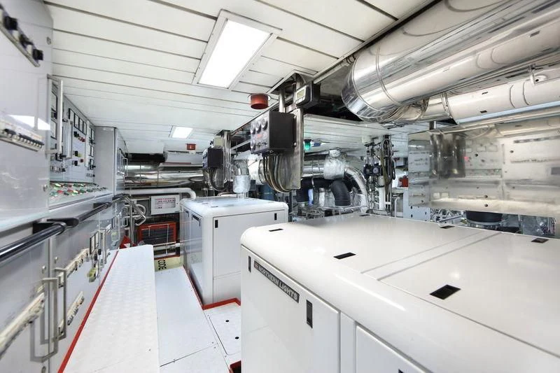 a large room with machinery aboard CODE 8 Yacht for Sale