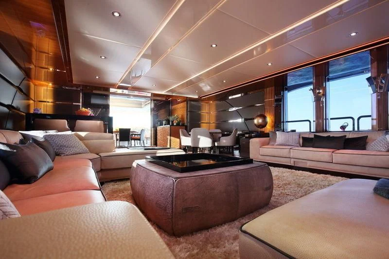 a living room with a large window aboard CODE 8 Yacht for Sale