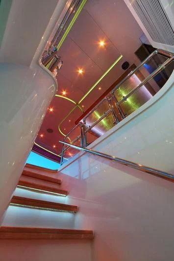 a staircase with a glass ceiling aboard CODE 8 Yacht for Sale
