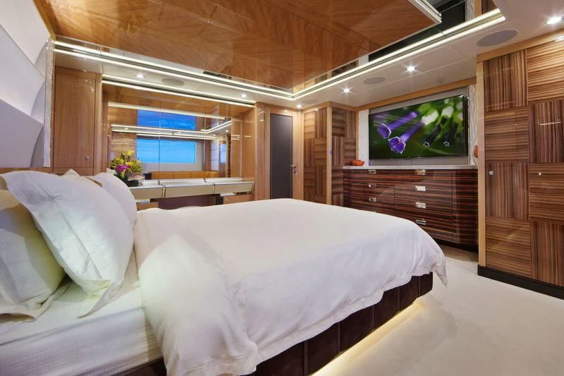 a bed in a room aboard CODE 8 Yacht for Sale