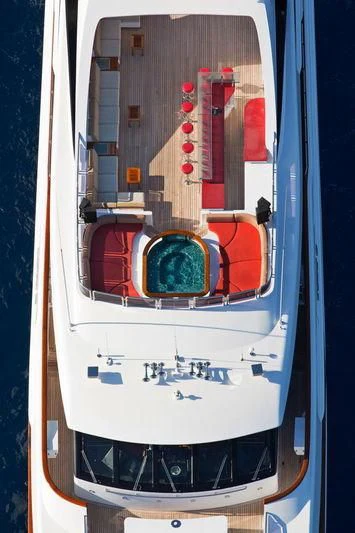 a white and blue boat aboard CODE 8 Yacht for Sale