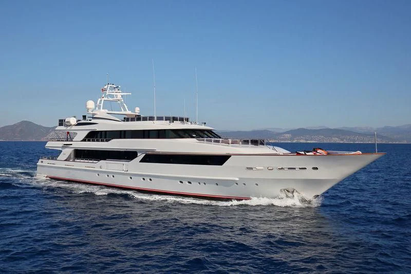 a white boat on the water aboard CODE 8 Yacht for Sale