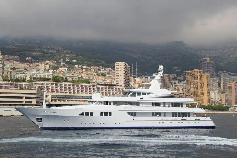 a large white boat in the water aboard PARAFFIN Yacht for Sale