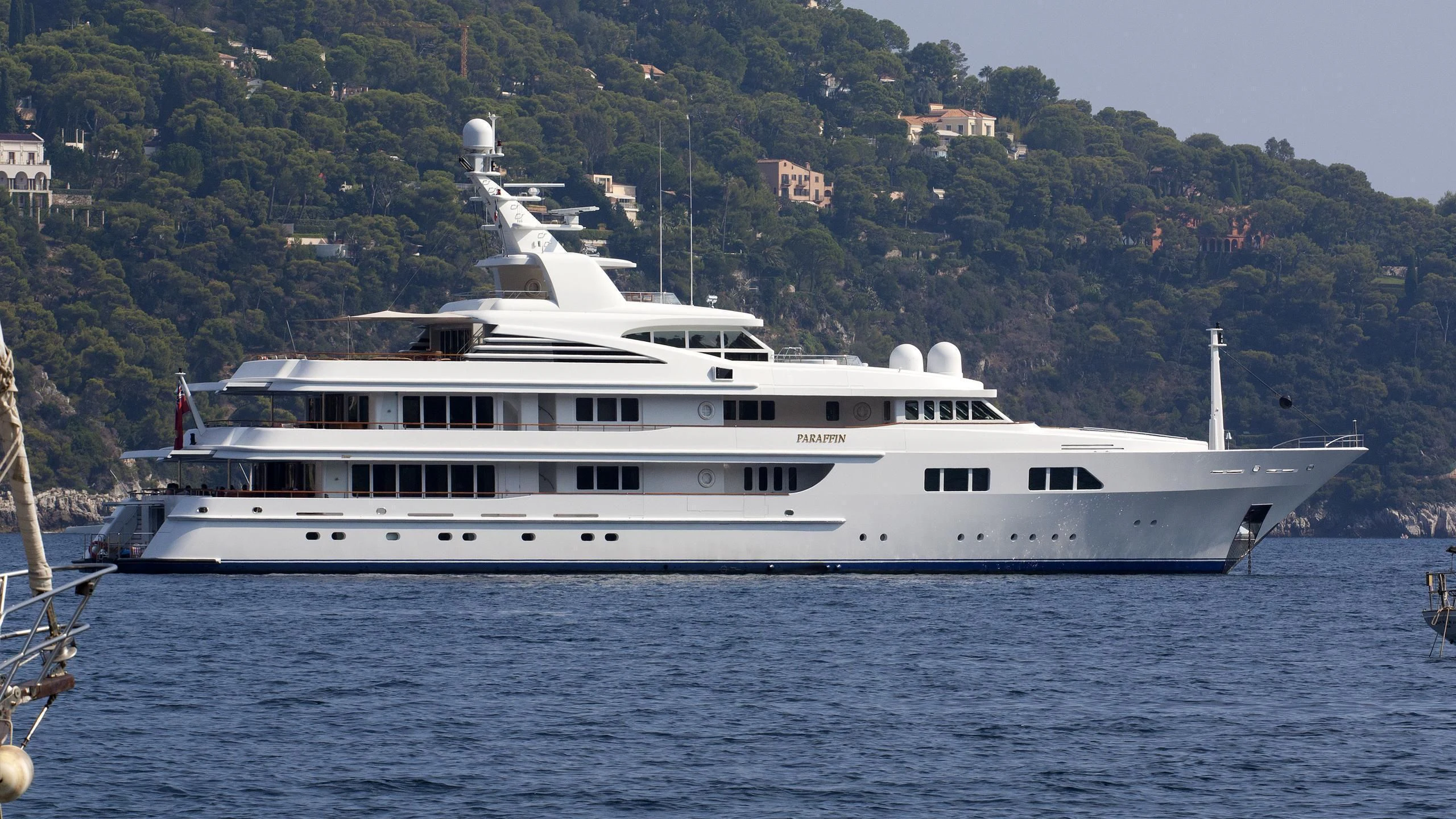 a large white boat in the water aboard PARAFFIN Yacht for Sale