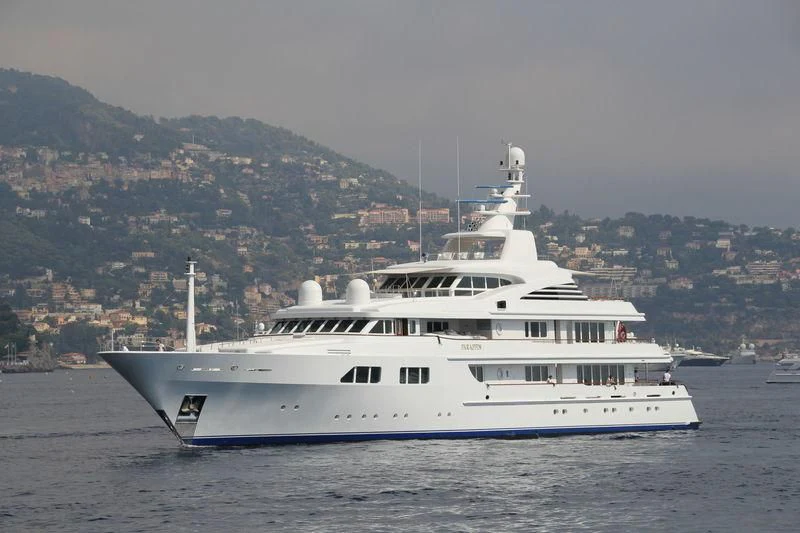 a large white boat in the water aboard PARAFFIN Yacht for Sale