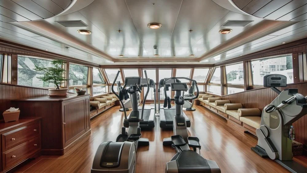 a room with treadmills aboard PARAFFIN Yacht for Sale