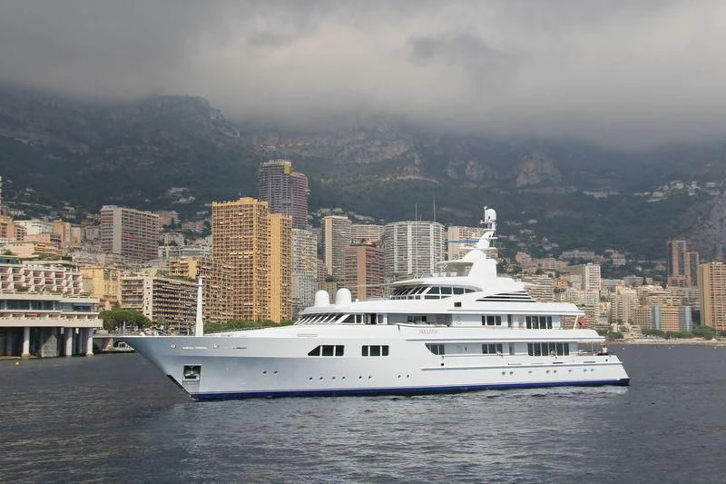 a large white boat in the water aboard PARAFFIN Yacht for Sale
