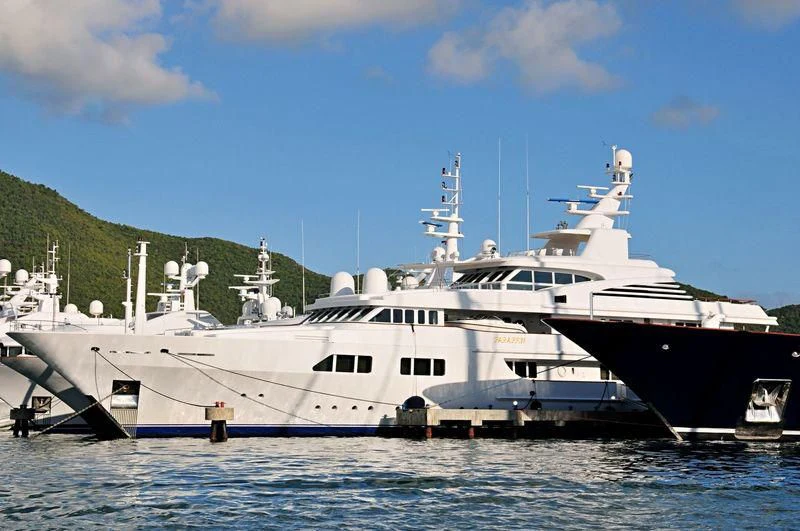 a large white boat in the water aboard PARAFFIN Yacht for Sale