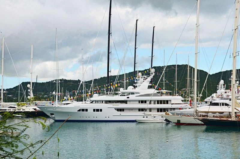 a group of boats are parked in a harbor aboard PARAFFIN Yacht for Sale