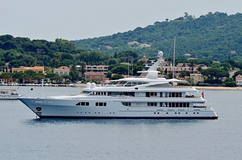 a large white boat in the water aboard PARAFFIN Yacht for Sale