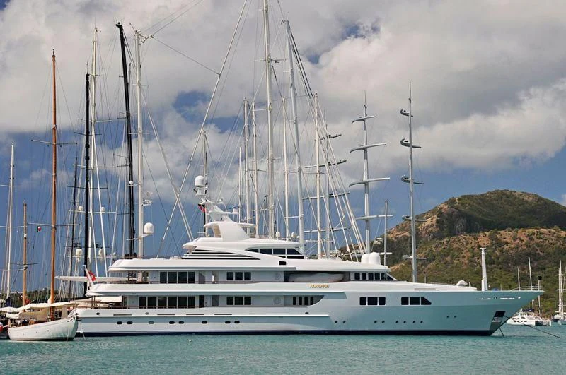 a white boat in the water aboard PARAFFIN Yacht for Sale