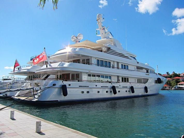 a large white boat in the water aboard PARAFFIN Yacht for Sale
