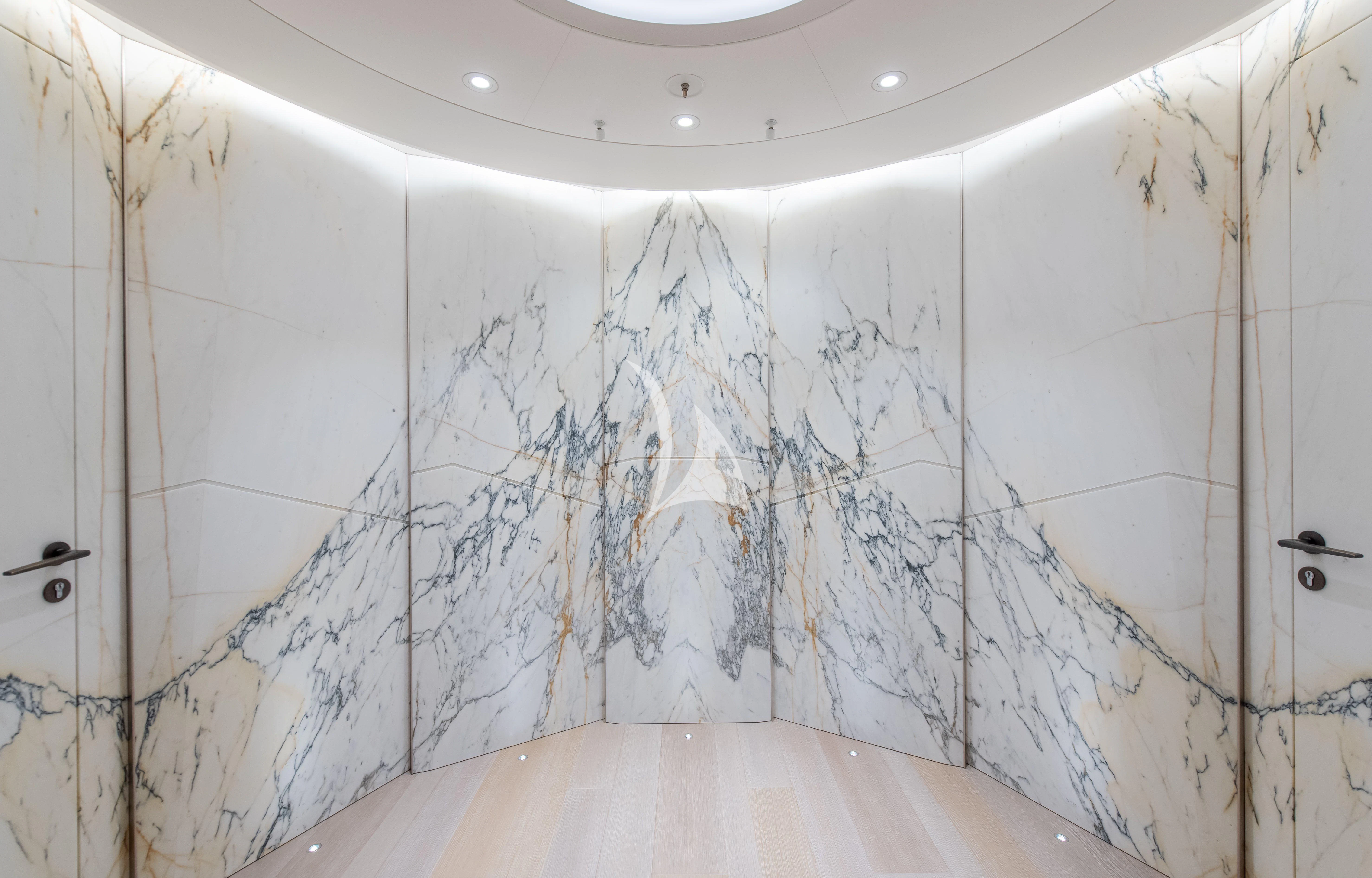 a room with white walls aboard SYNTHESIS Yacht for Sale