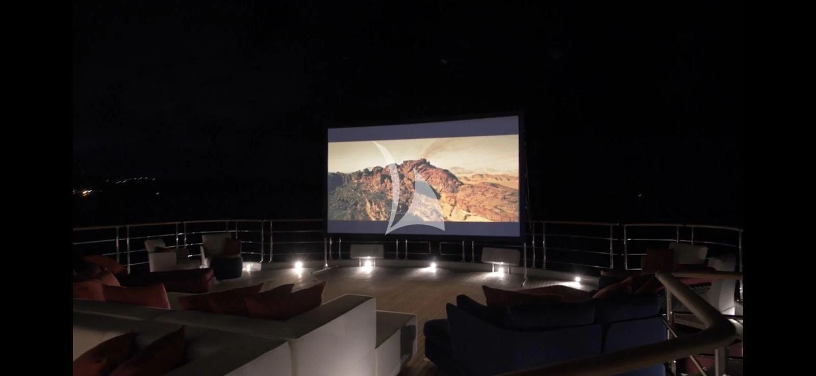 a large screen in a room aboard SYNTHESIS Yacht for Sale