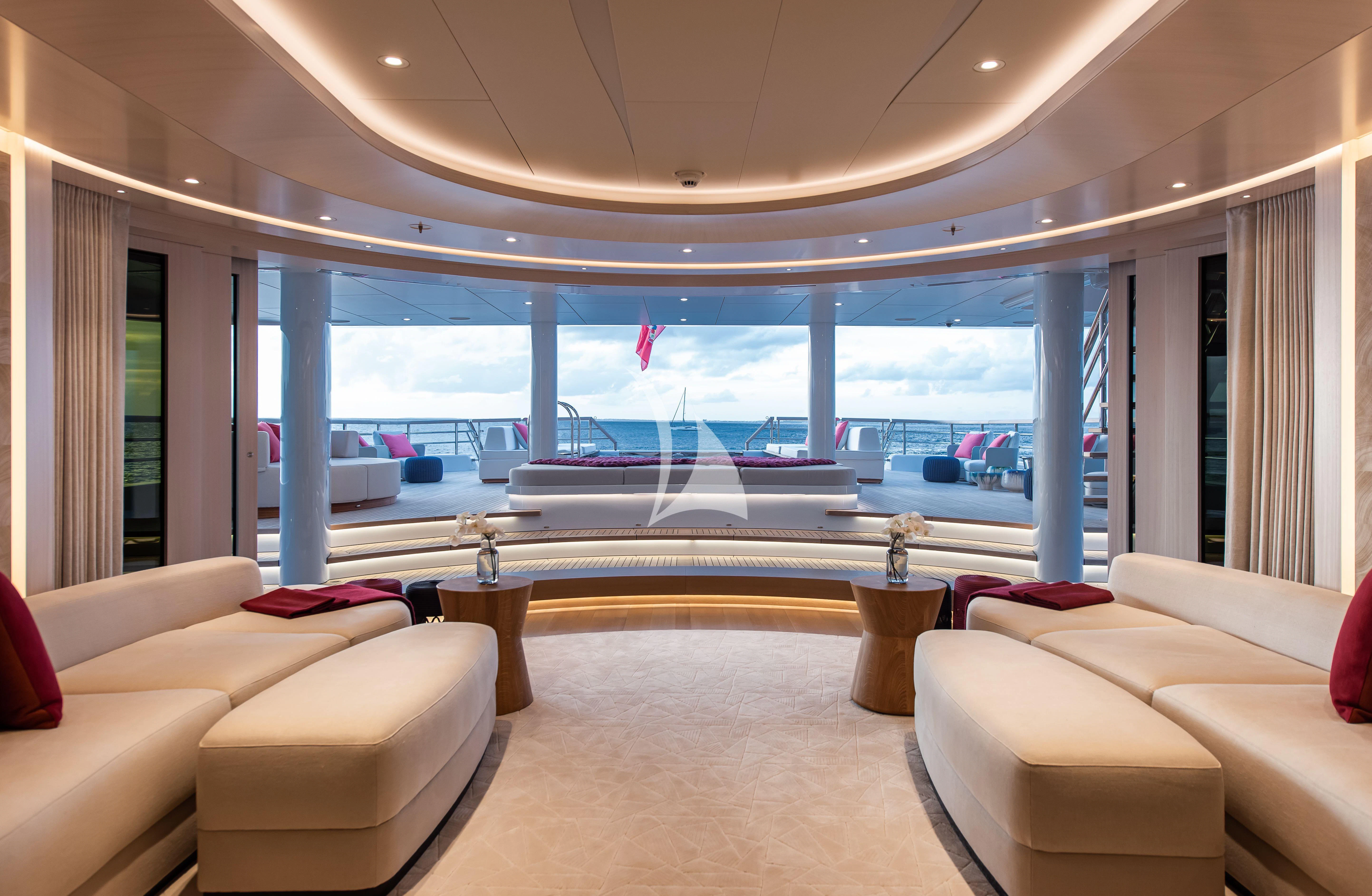 a living room with a large window aboard SYNTHESIS Yacht for Sale