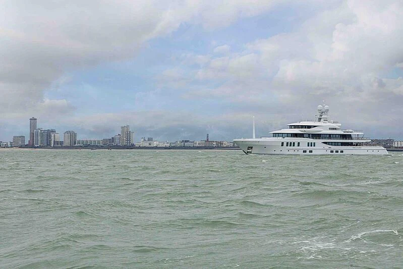 a white boat in the water aboard SYNTHESIS Yacht for Sale