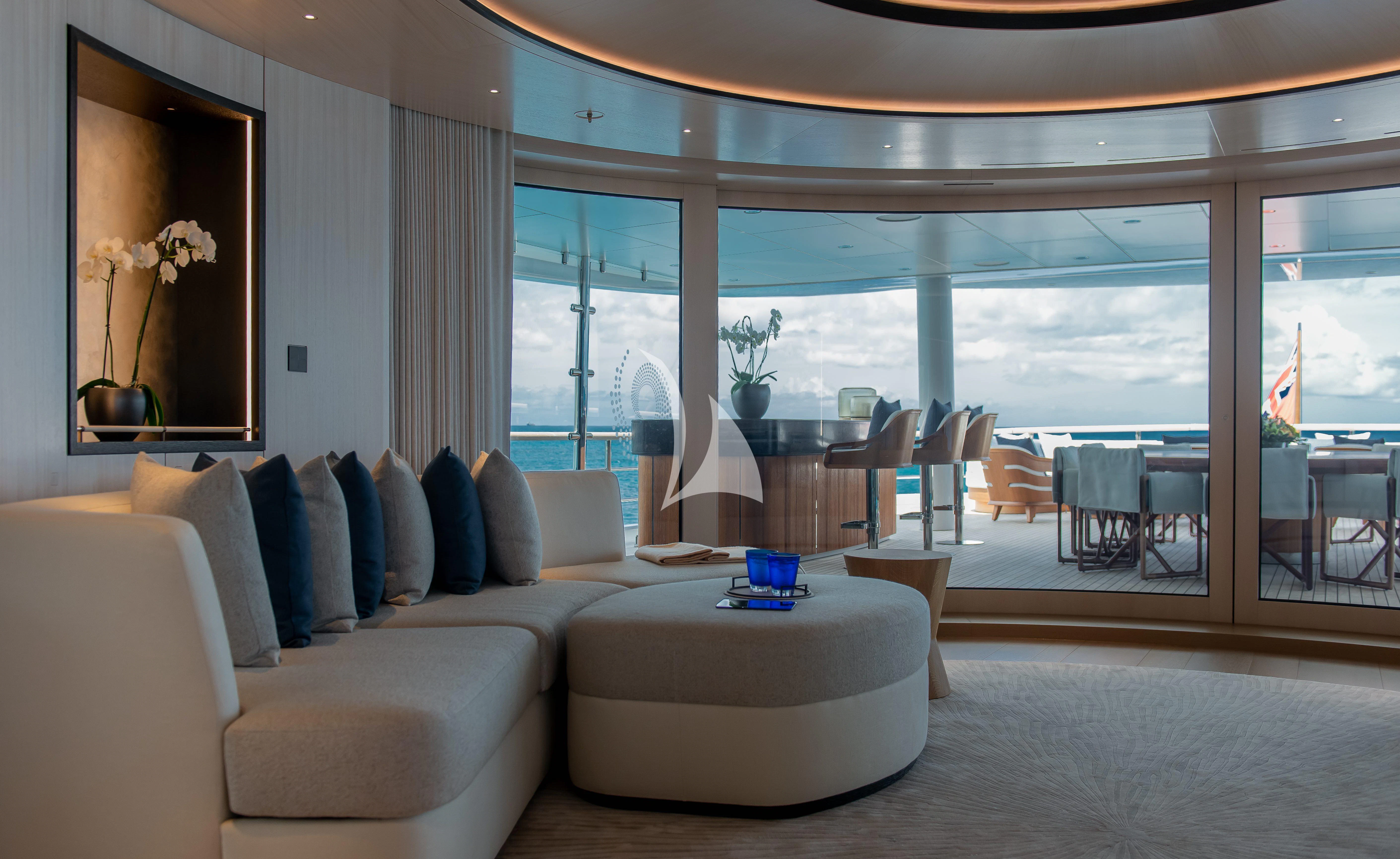 a living room with a large window aboard SYNTHESIS Yacht for Sale