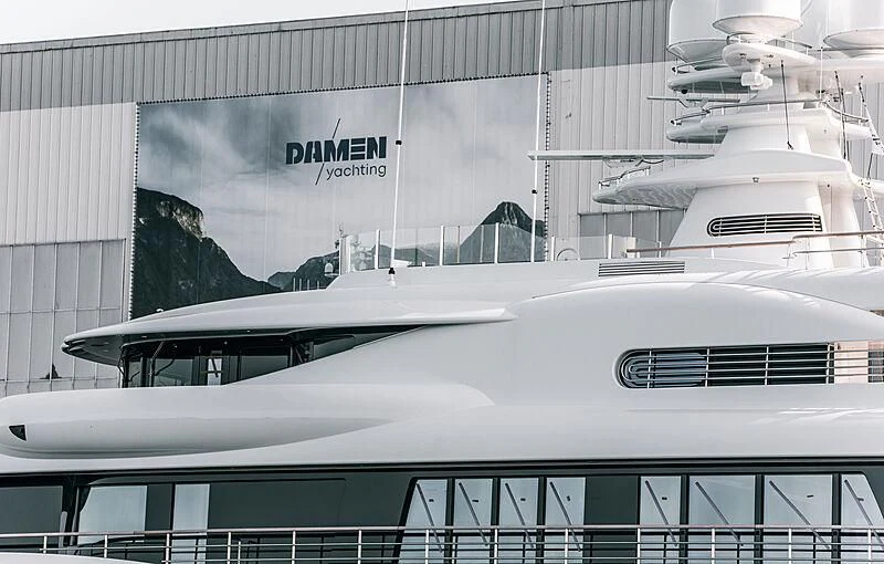 a building with a large white building behind it aboard SYNTHESIS Yacht for Sale