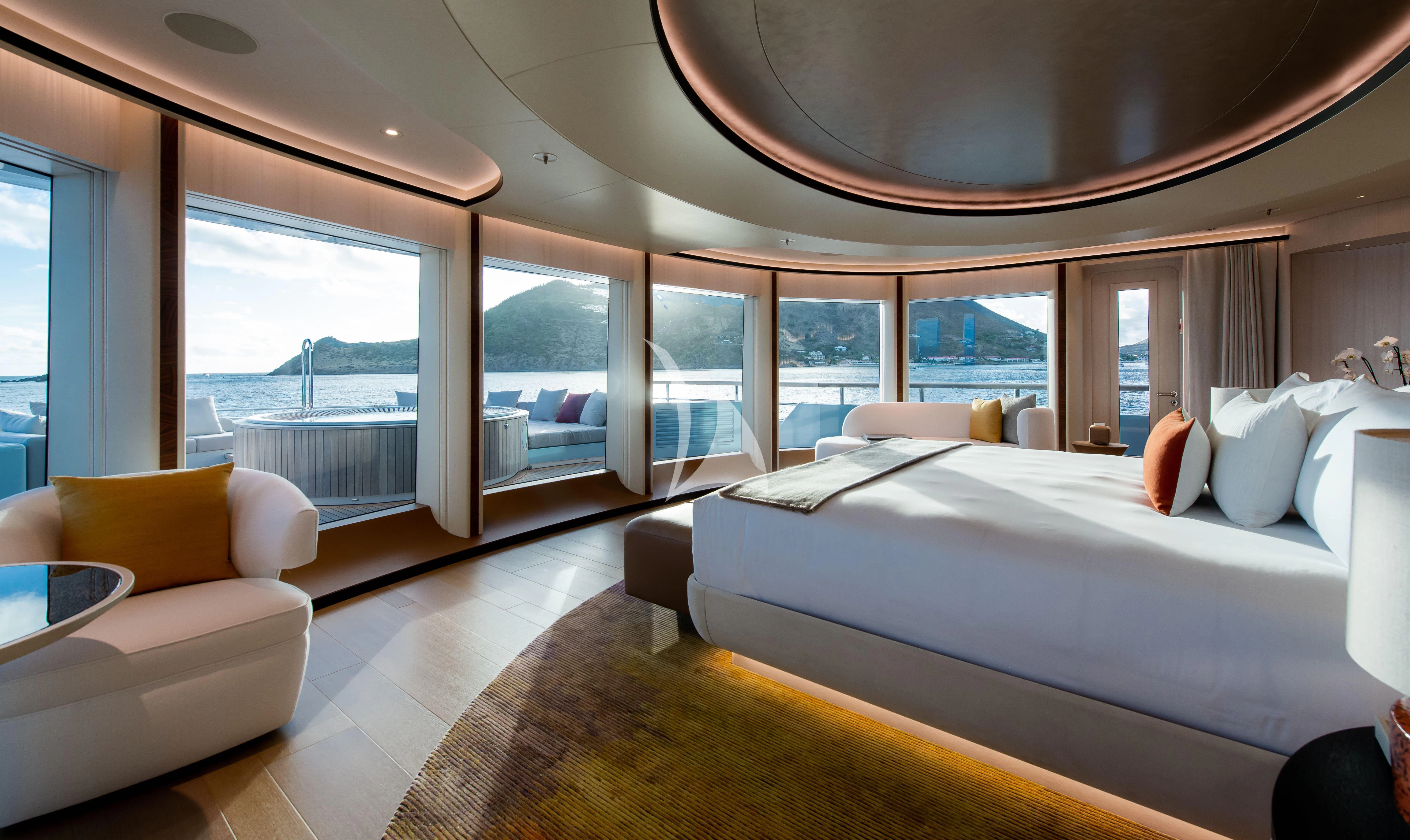 a large bedroom with a large bed aboard SYNTHESIS Yacht for Sale