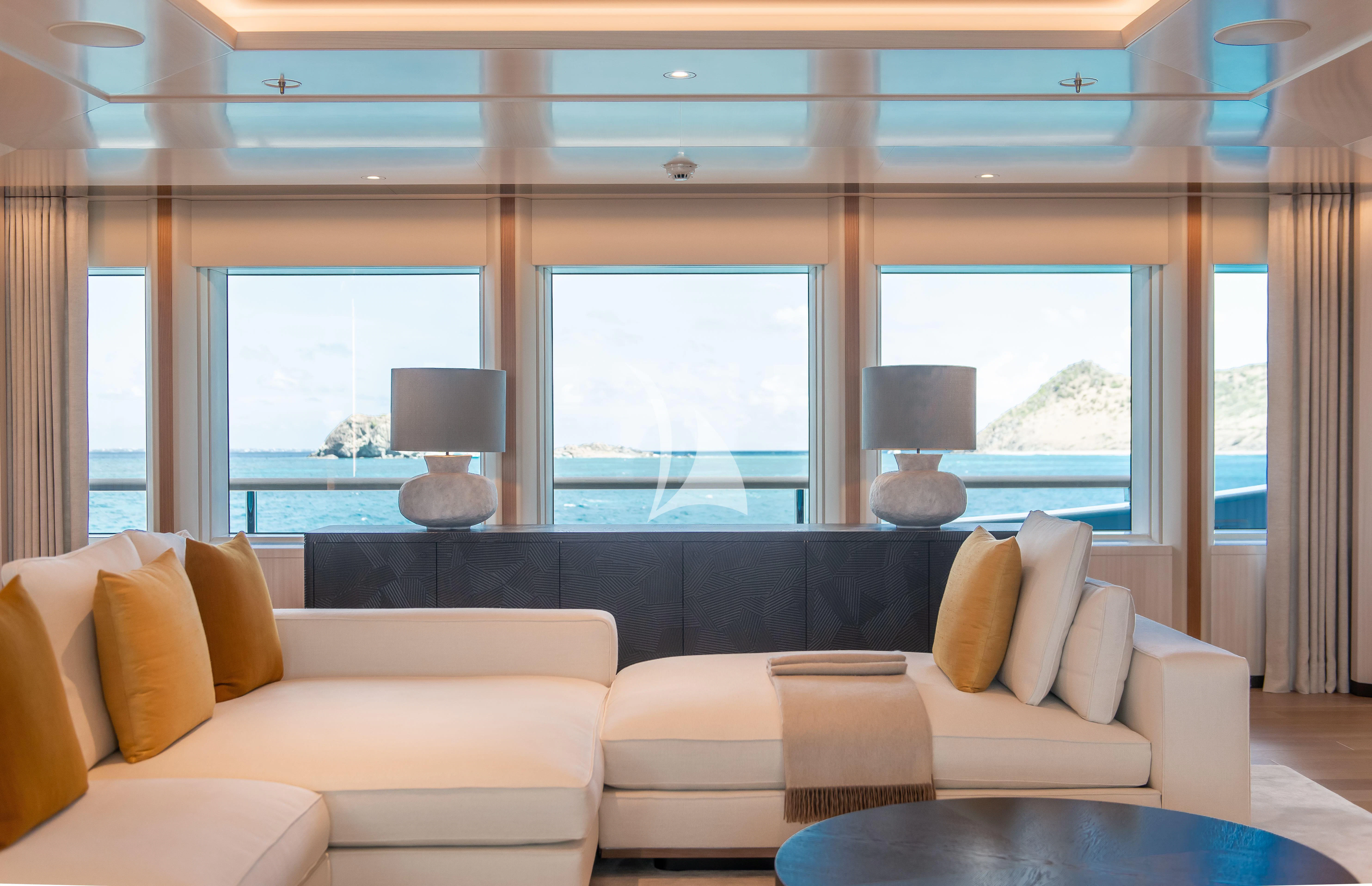 a living room with a large window aboard SYNTHESIS Yacht for Sale
