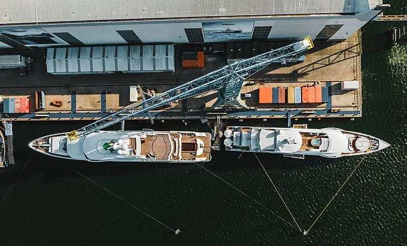 a helicopter on a field aboard SYNTHESIS Yacht for Sale