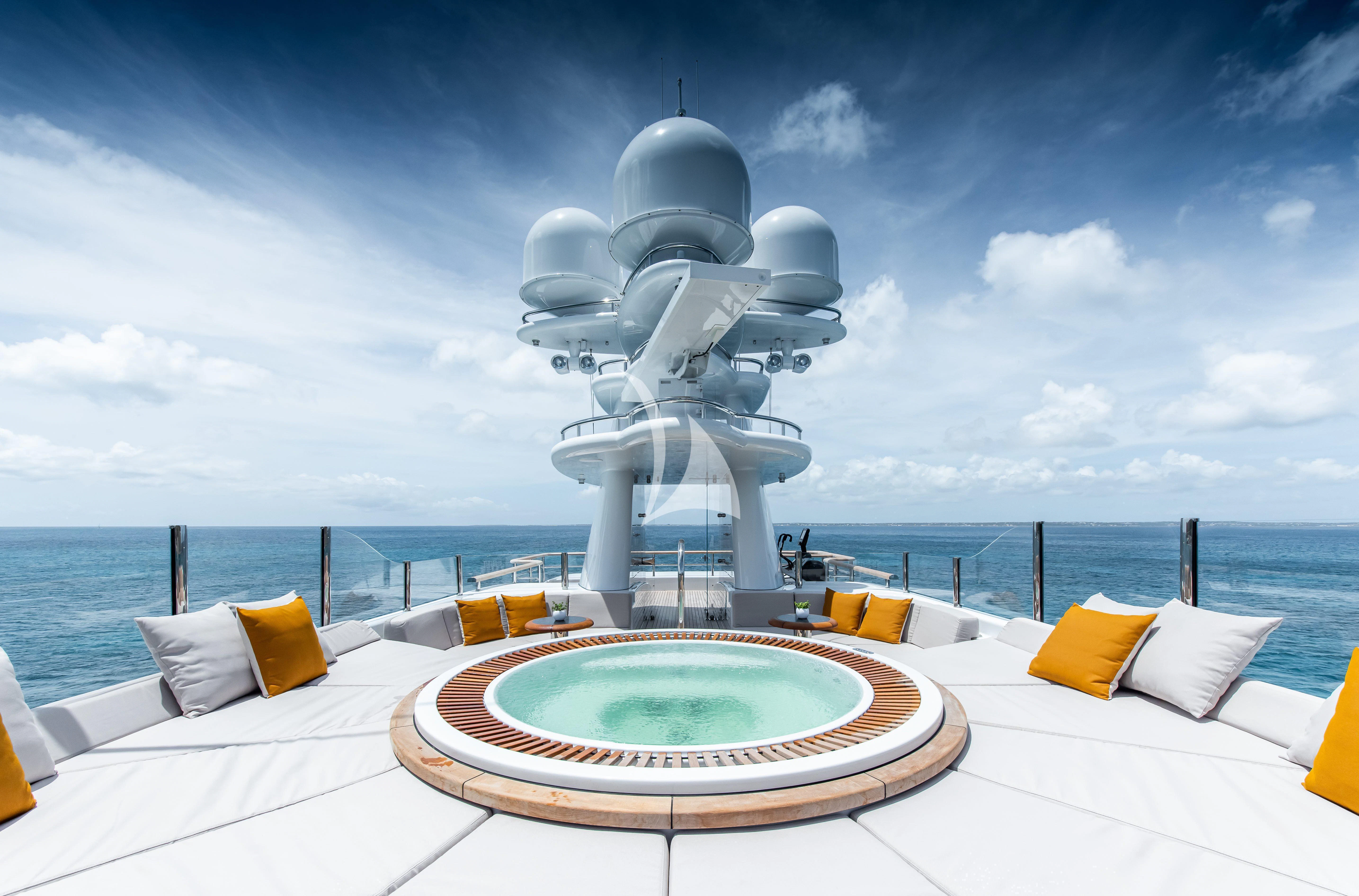 a large white sculpture on a beach aboard SYNTHESIS Yacht for Sale