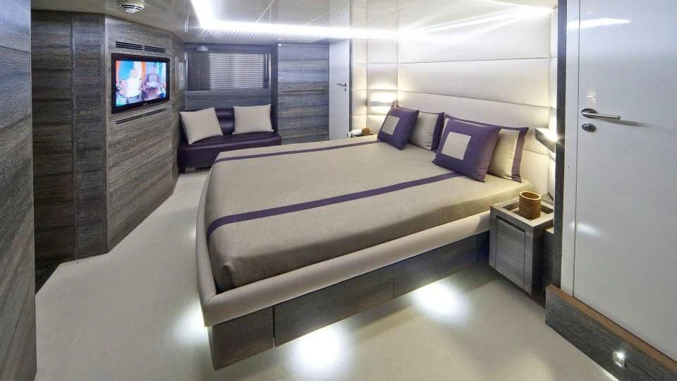 a bed in a room aboard TOBY Yacht for Sale