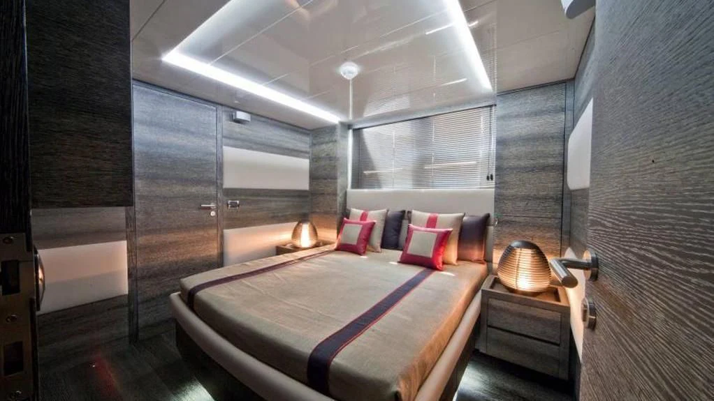 a bed in a room aboard TOBY Yacht for Sale