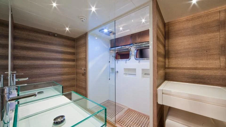 a room with a sink and cabinets aboard TOBY Yacht for Sale