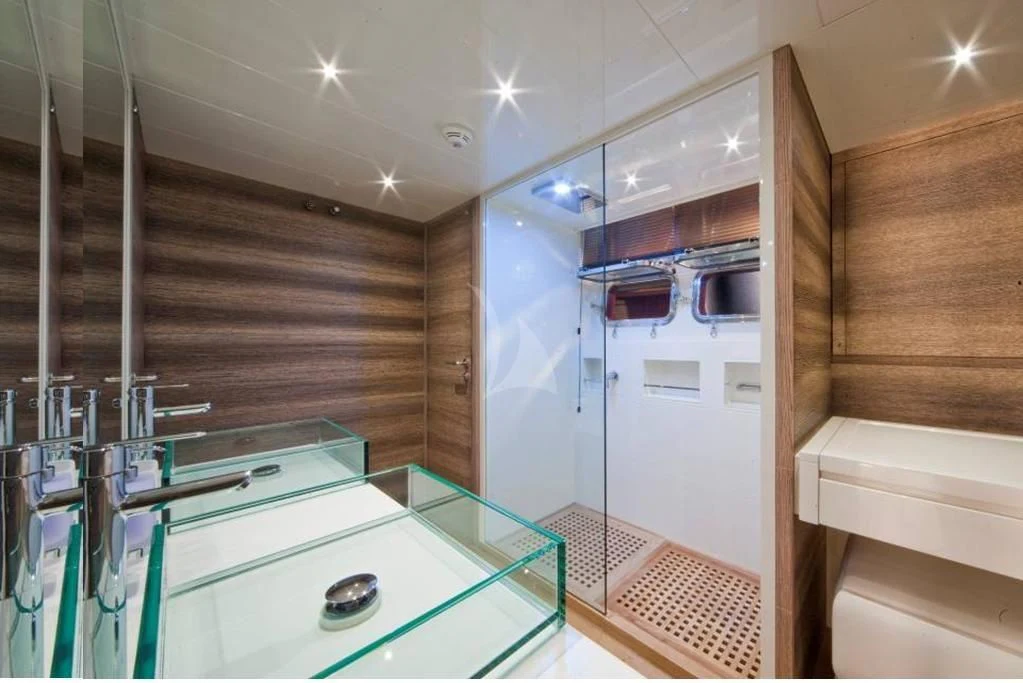 a room with a sink and a bunk bed aboard TOBY Yacht for Sale