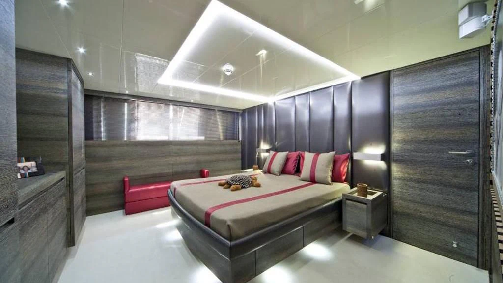 a bed in a room aboard TOBY Yacht for Sale