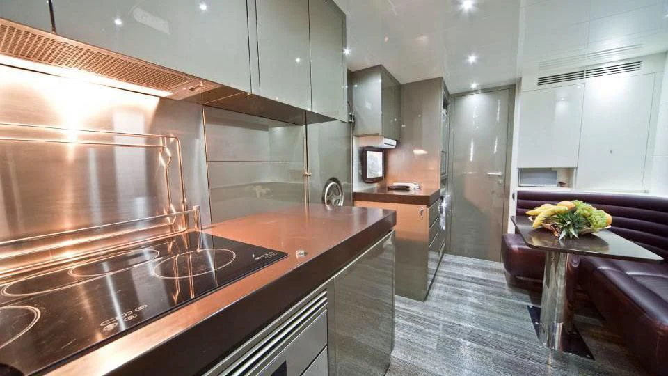 a kitchen with a large island aboard TOBY Yacht for Sale