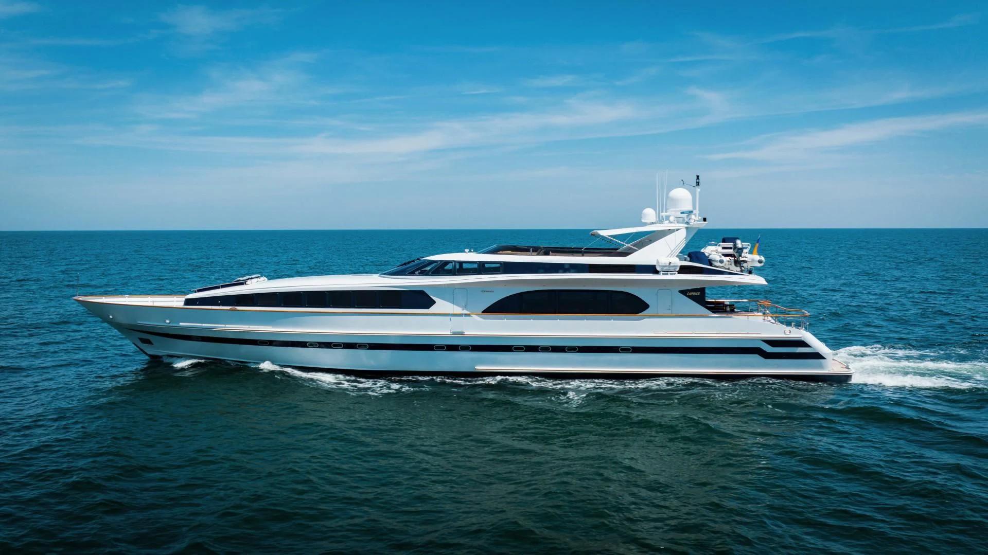 a white yacht on the water aboard DREAM RIDER Yacht for Sale