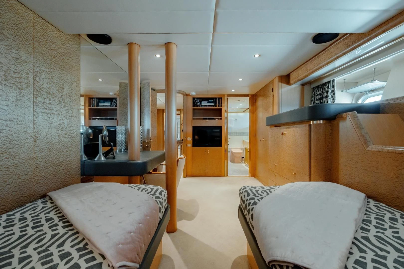 a room with a couch and a table aboard DREAM RIDER Yacht for Sale