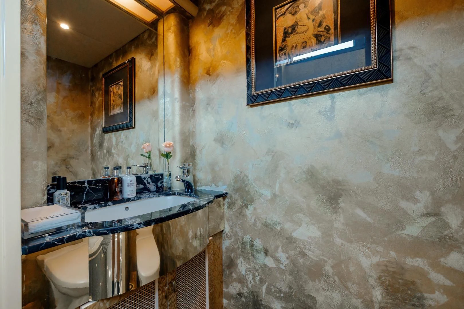 a bathroom with a sink and a toilet aboard DREAM RIDER Yacht for Sale