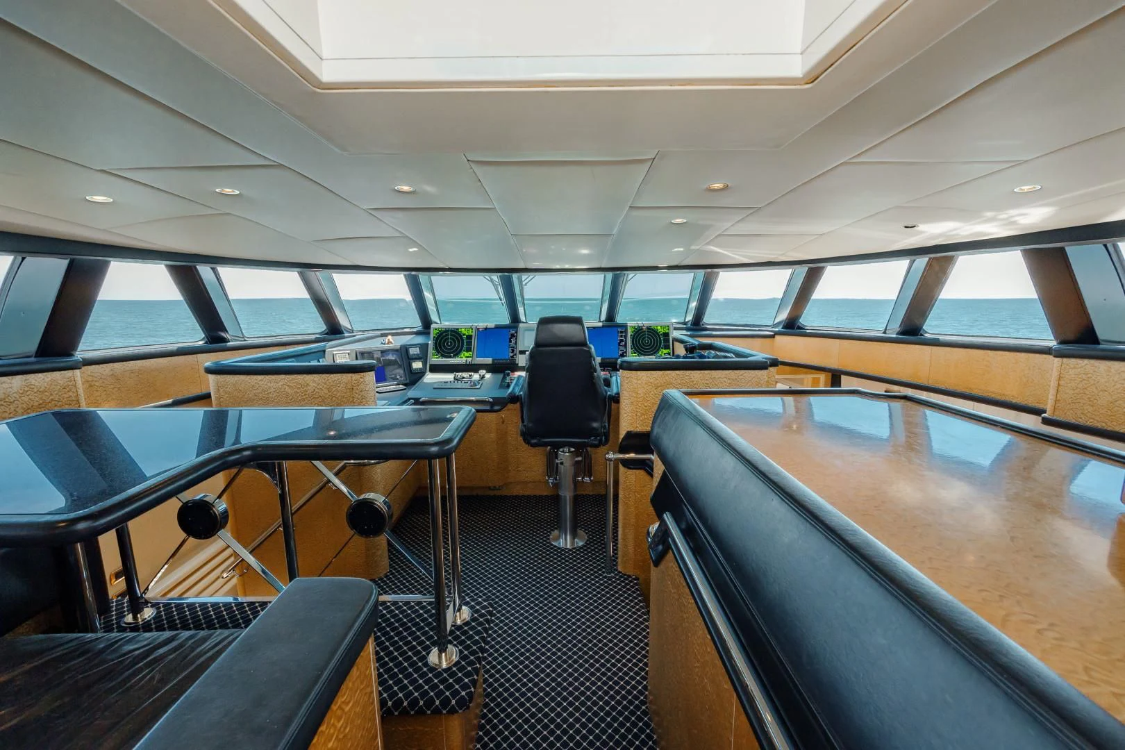 inside of a vehicle with seats and a steering wheel aboard DREAM RIDER Yacht for Sale