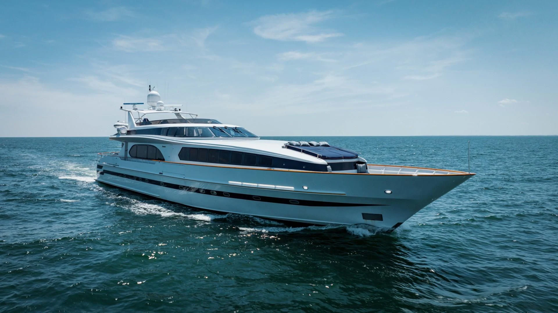 a white yacht in the water aboard DREAM RIDER Yacht for Sale