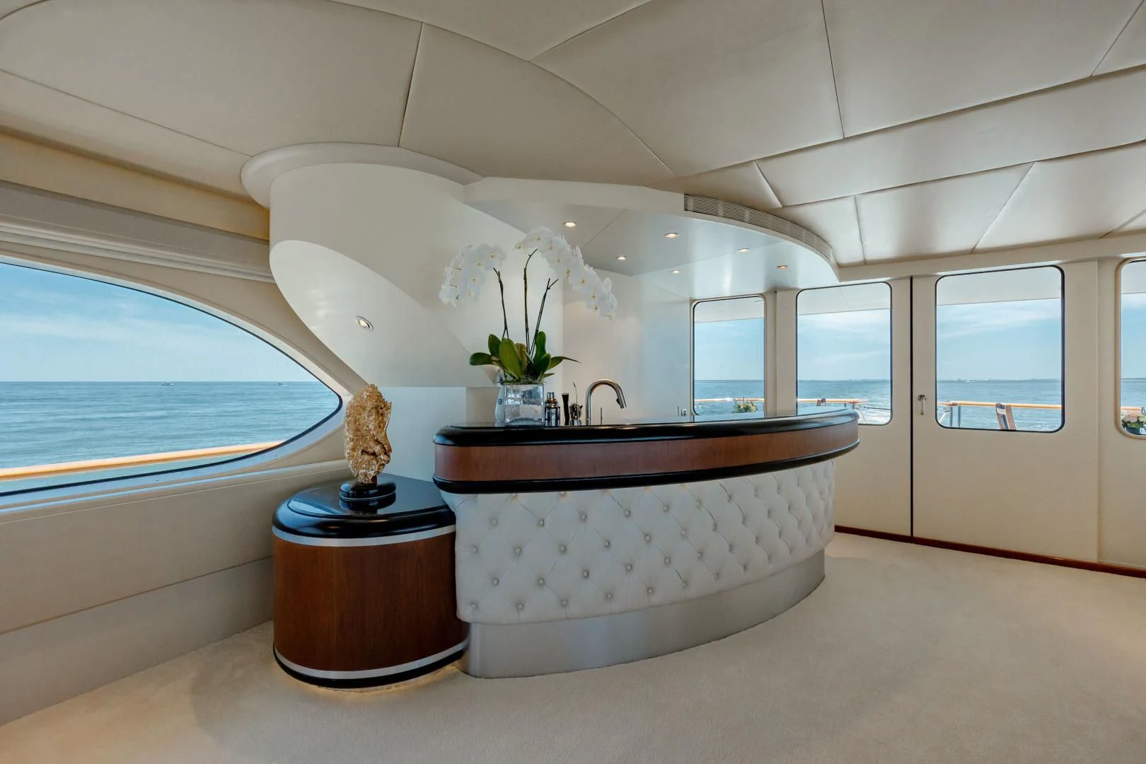 a large white bathtub with a marbled floor aboard DREAM RIDER Yacht for Sale