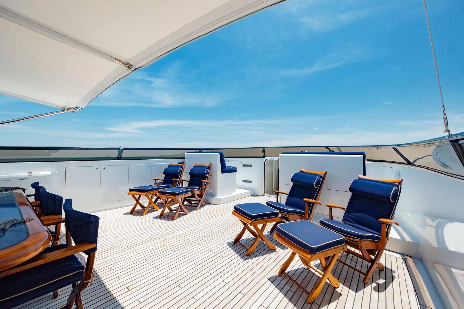 a large room with chairs and tables aboard DREAM RIDER Yacht for Sale